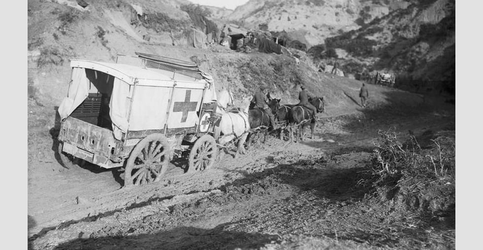 An ambulance wagon of the 42nd (East Lancashire) Division in Gully Ravine, showing the mud after the storm of November 1915.