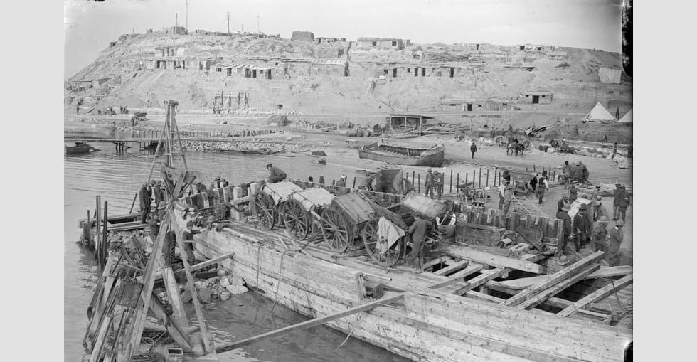 Artillery limbers being off-loaded at W Beach, Cape Helles.