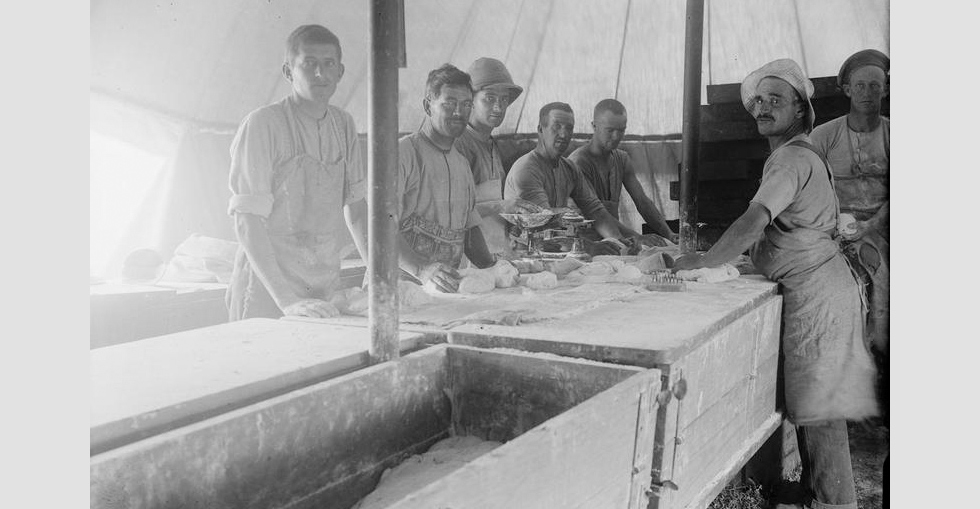 Bread making in tents on 'Bakery Beach'. The first issue of bread was made on 21 May 1915.