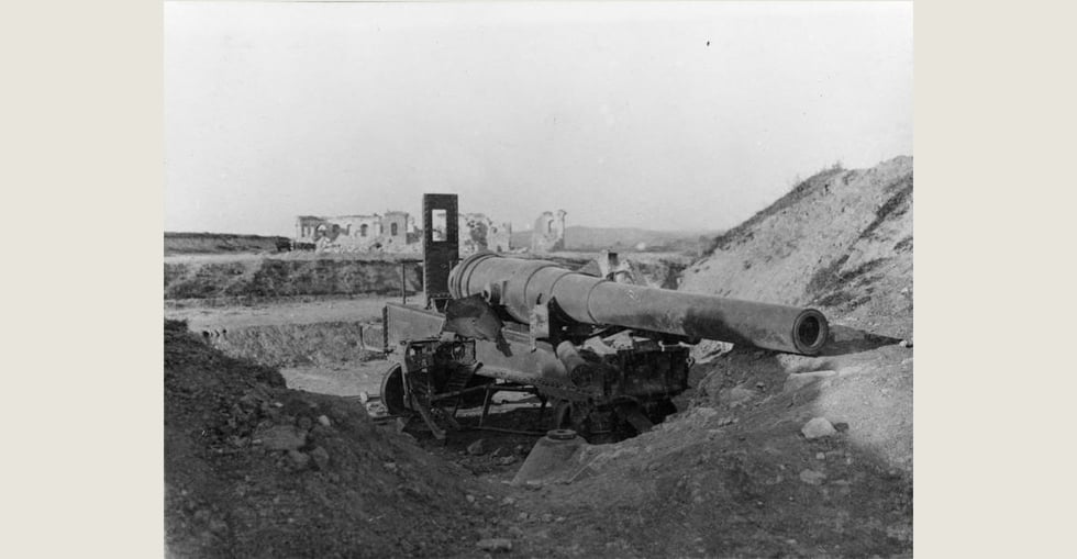 A scene after the naval bombardment of the Dardanelles ports, prior to the Gallipoli landings. The 9.4 inch coastal defence gun on Fort I (Cape Helles) having been dismounted by a direct hit.