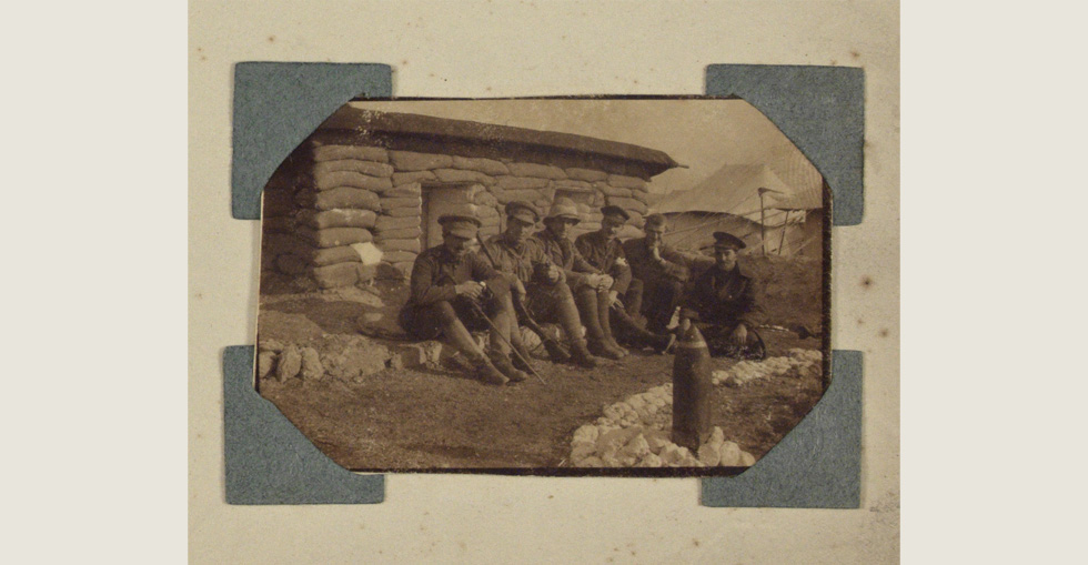 Group of soldiers outside a dugout