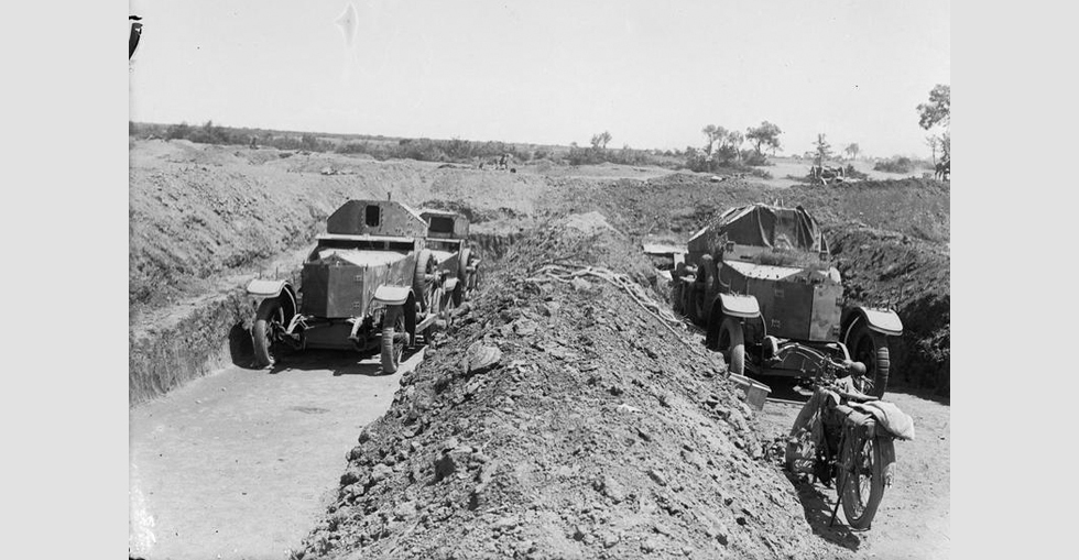 Two Rolls-Royce cars of the Armoured Car Section of the Royal Naval Division, under Lieutenant Commander Josiah Wedgwood, in the shelters dug to minimise the risks from shell fire.