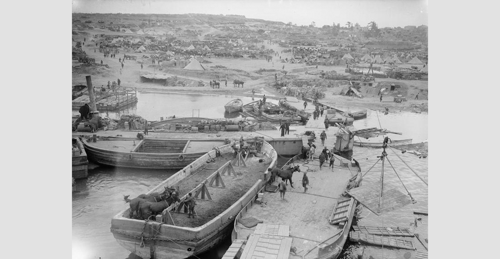 A view of 'V' Beach, Cape Helles, taken from transport ship River Clyde. Horses are disembarked from the nearest lighter.