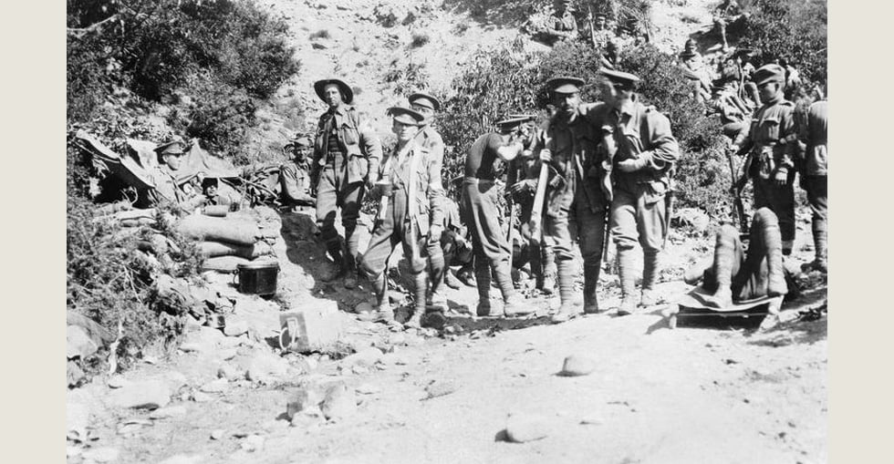 Wounded soldiers head for the Australian 3rd Battalion dressing station in Shrapnel Gully, Gallipoli, on 26 April 1915.