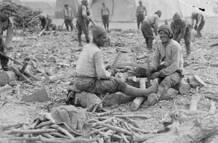Turkish prisoners chopping up firewood, which was very scarce. (Imperial War Museum)